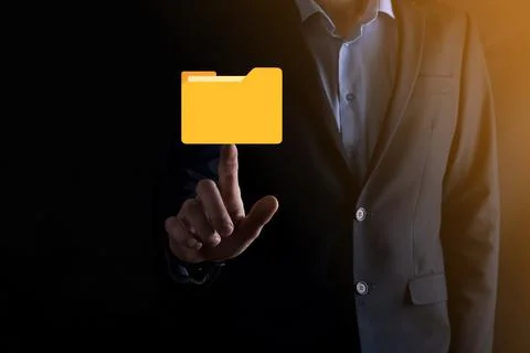 Businessman hold folder icon.Document Management System or DMS setup by IT co Stock Photos