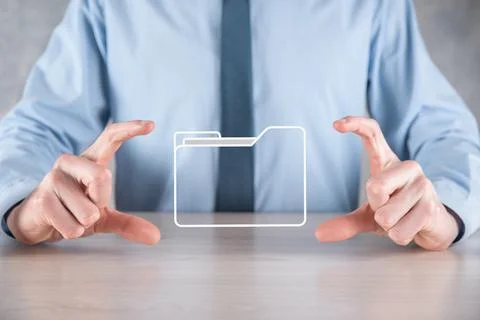 Businessman hold folder icon.Document Management System or DMS setup by IT co 写真素材