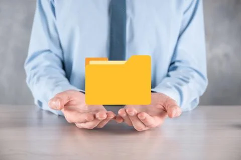 Businessman hold folder icon.Document Management System or DMS setup by IT co Stock Photos