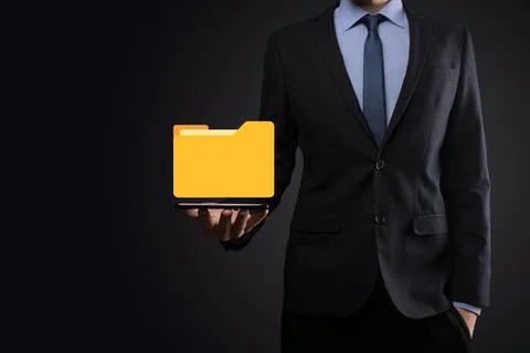 Businessman hold folder icon.Document Management System or DMS setup by IT co Stockfoto's