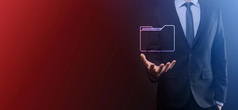 Businessman hold folder icon.Document Management System or DMS setup by IT co Stockfoto's