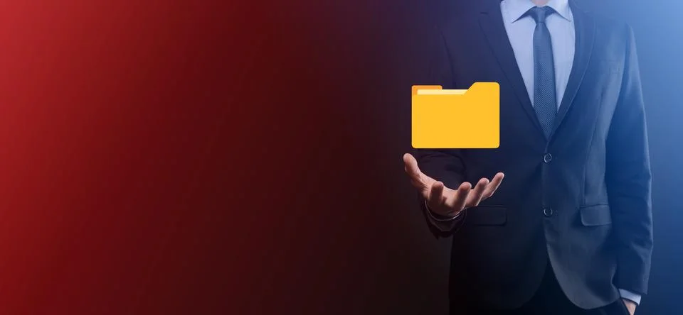 Businessman hold folder icon.Document Management System or DMS setup by IT co Stockfoto's