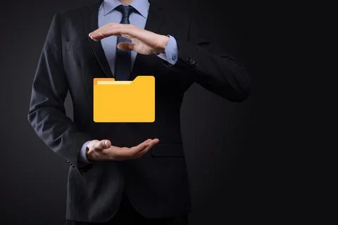 Businessman hold folder icon.Document Management System or DMS setup by IT co Stock Photos