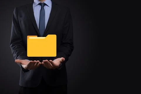 Businessman hold folder icon.Document Management System or DMS setup by IT co 写真素材