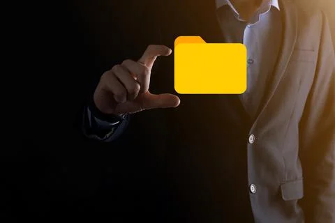 Businessman hold folder icon.Document Management System or DMS setup by IT co Stock Photos