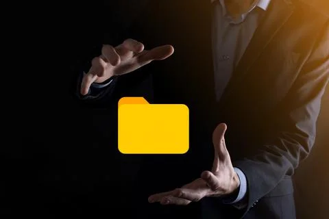 Businessman hold folder icon.Document Management System or DMS setup by IT co Photos