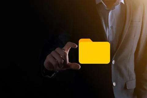 Businessman hold folder icon.Document Management System or DMS setup by IT co 库存照片