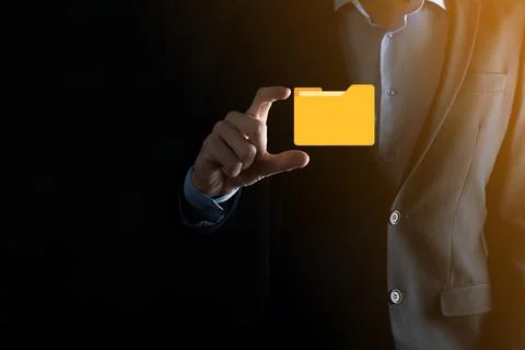 Businessman hold folder icon.Document Management System or DMS setup by IT co Stock Photos