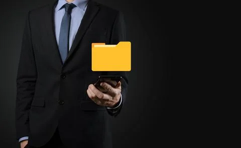 Businessman hold folder icon.Document Management System or DMS setup by IT co Stockfoto's