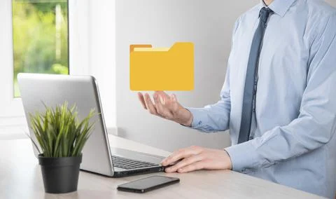 Businessman hold folder icon.Document Management System or DMS setup by IT co 写真素材