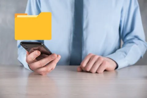 Businessman hold folder icon.Document Management System or DMS setup by IT co 写真素材