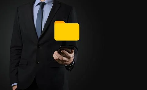 Businessman hold folder icon.Document Management System or DMS setup by IT co Stockfoto's