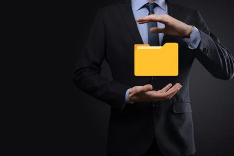 Businessman hold folder icon.Document Management System or DMS setup by IT co 写真素材