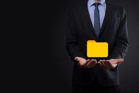 Businessman hold folder icon.Document Management System or DMS setup by IT co Stock Photos