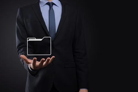 Businessman hold folder icon.Document Management System or DMS setup by IT co Stock Photos