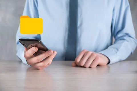 Businessman hold folder icon.Document Management System or DMS setup by IT co 写真素材