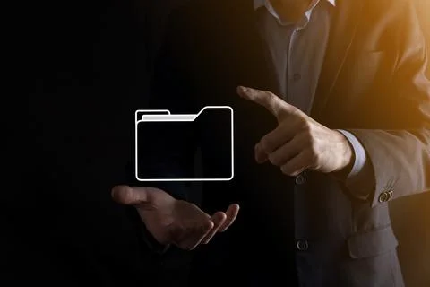 Businessman hold folder icon.Document Management System or DMS setup by IT co 写真素材