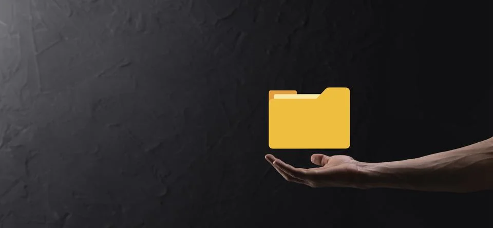 Businessman hold folder icon.Document Management System or DMS setup by IT co Stockfoto's