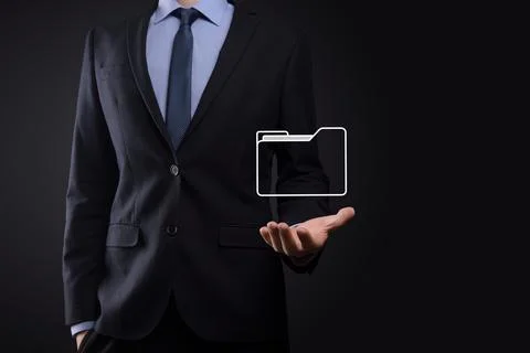Businessman hold folder icon.Document Management System or DMS setup by IT co Stock Photos