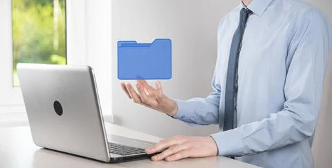 Businessman hold folder icon.Document Management System or DMS setup by IT co 写真素材