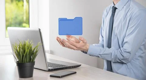 Businessman hold folder icon.Document Management System or DMS setup by IT co 写真素材