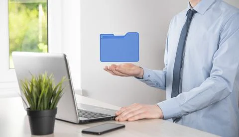 Businessman hold folder icon.Document Management System or DMS setup by IT co 写真素材