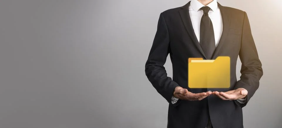 Businessman hold folder icon.Document Management System or DMS setup by IT co Stockfoto's