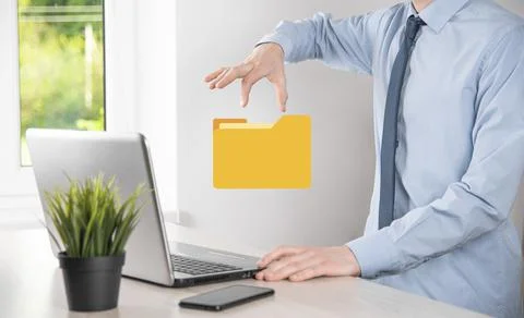 Businessman hold folder icon.Document Management System or DMS setup by IT co Stock Photos