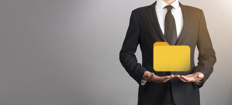 Businessman hold folder icon.Document Management System or DMS setup by IT co 写真素材
