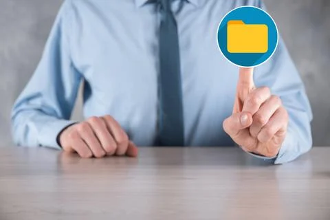 Businessman hold folder icon.Document Management System or DMS setup by IT co Stockfoto's