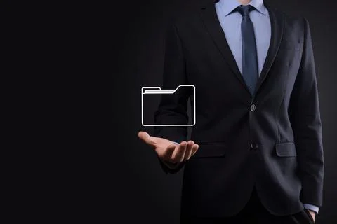 Businessman hold folder icon.Document Management System or DMS setup by IT co 写真素材
