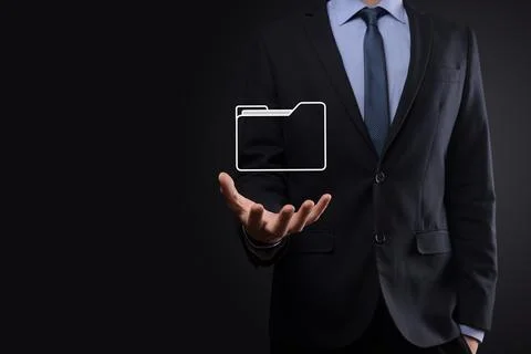 Businessman hold folder icon.Document Management System or DMS setup by IT co 写真素材