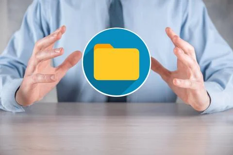 Businessman hold folder icon.Document Management System or DMS setup by IT co 写真素材