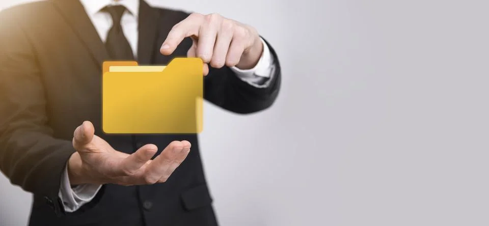Businessman hold folder icon.Document Management System or DMS setup by IT co 写真素材