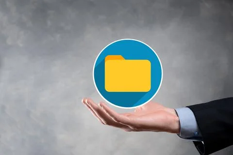 Businessman hold folder icon.Document Management System or DMS setup by IT co 写真素材