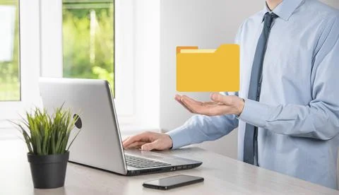 Businessman hold folder icon.Document Management System or DMS setup by IT co 写真素材