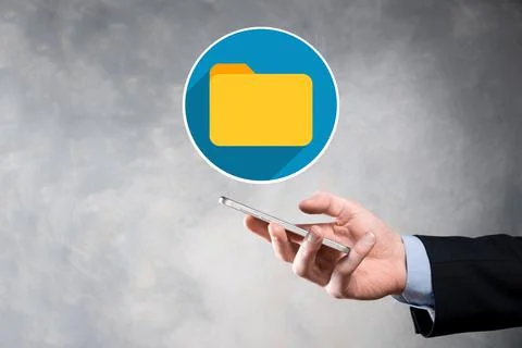 Businessman hold folder icon.Document Management System or DMS setup by IT co 写真素材