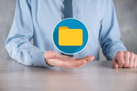 Businessman hold folder icon.Document Management System or DMS setup by IT co 写真素材