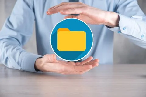 Businessman hold folder icon.Document Management System or DMS setup by IT co 写真素材
