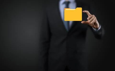 Businessman hold folder icon.Document Management System or DMS setup by IT co 写真素材