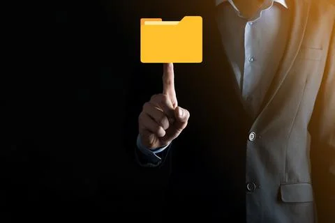 Businessman hold folder icon.Document Management System or DMS setup by IT co 写真素材