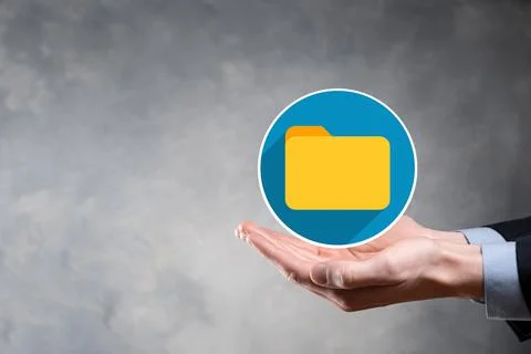 Businessman hold folder icon.Document Management System or DMS setup by IT co Stockfoto's