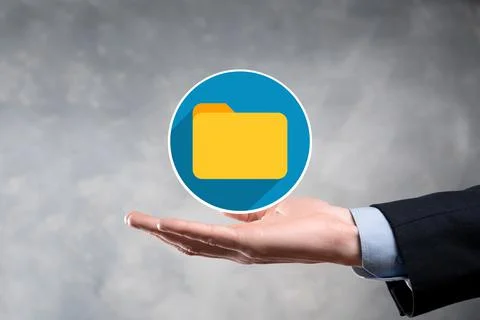 Businessman hold folder icon.Document Management System or DMS setup by IT co Stock Photos