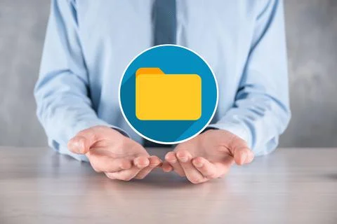 Businessman hold folder icon.Document Management System or DMS setup by IT co Stockfoto's