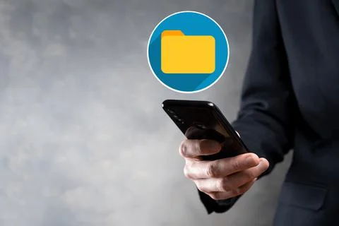 Businessman hold folder icon.Document Management System or DMS setup by IT co Stock Photos