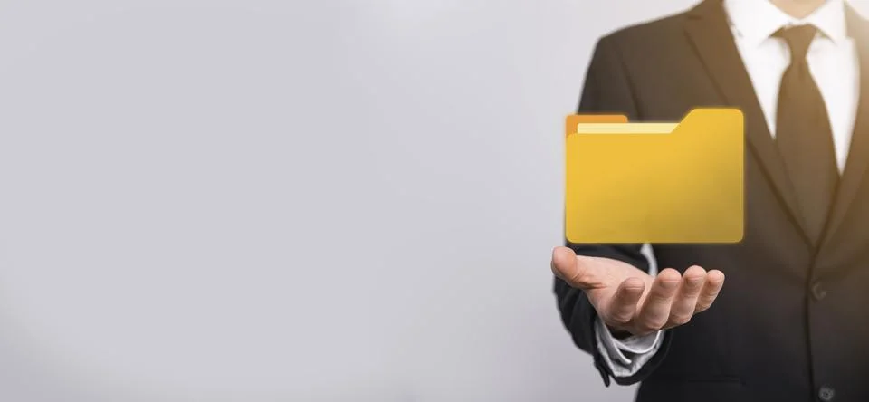 Businessman hold folder icon.Document Management System or DMS setup by IT co Foto stock