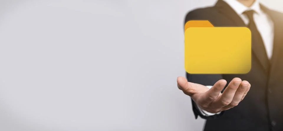 Businessman hold folder icon.Document Management System or DMS setup by IT co 写真素材