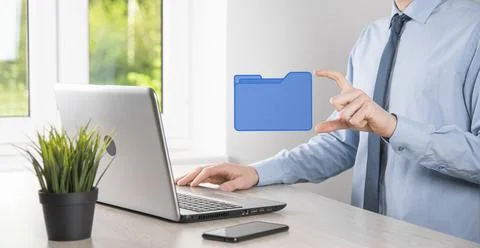 Businessman hold folder icon.Document Management System or DMS setup by IT co Foto stock