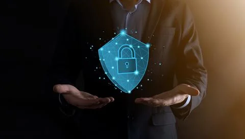 Businessman hold low poly polygon shield with a padlock icon.Secure Access Sy Stock Photos
