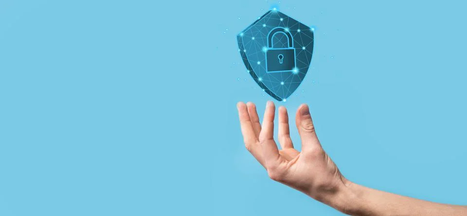 Businessman hold low poly polygon shield with a padlock icon.Secure Access Sy Stock Photos